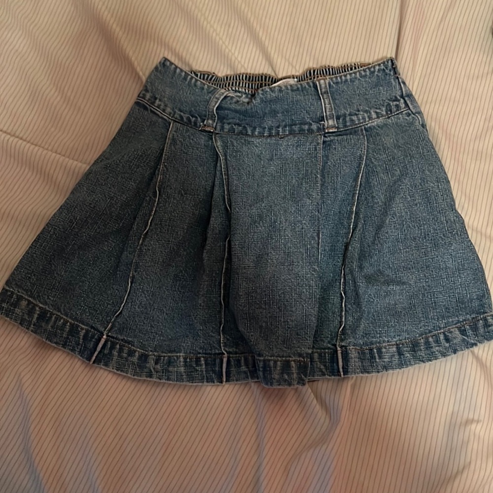 Girls pull on jean skirt